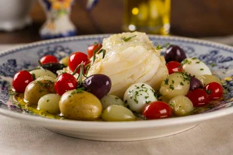 A typical Portuguese dish with codfish called Bacalhau do Porto in a origin.. Stock Photos