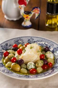 A typical Portuguese dish with codfish called Bacalhau do Porto in a origin.. Stock Photos