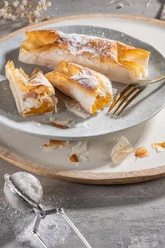 Typical portuguese sweets Pasteis de Vouzela served on countertop. Filo pastr Stock Photos