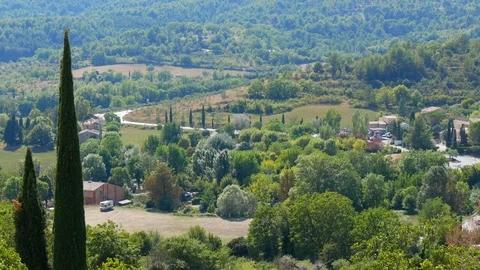 Typical Provence landscape with trees and winding road Stock Footage 116992751