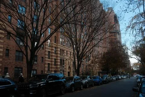 Typical red brick apartment block on a clear blue sky day in Chelsea, New York Stock Photos