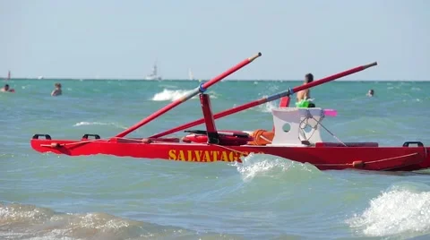 Typical red rescue boat and swimmers, Rimini, Italy Видео 41246863