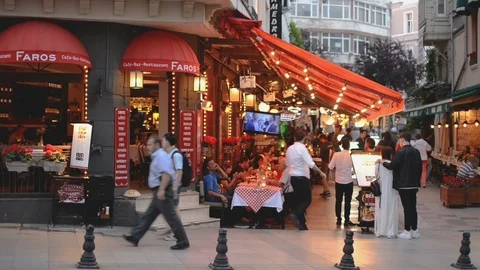 A typical restaurant with diners at dusk in Fatih, Golden Horn, Istanbul Stock Footage 92531532