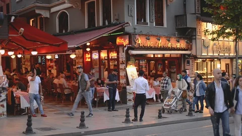 A typical restaurant with diners at dusk in Fatih, Golden Horn, Istanbul Stock Footage 92531648