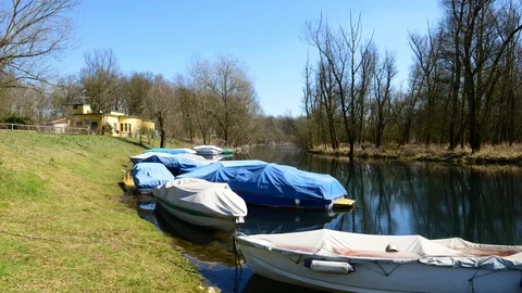 Typical river boats moored and covered Stock Footage 87342898
