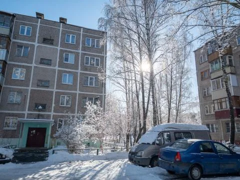 Typical Russian yard in the winter. Old Soviet houses Khrushchev architecture Stock Photos