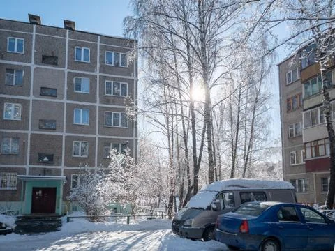 Typical Russian yard in the winter. Old Soviet houses Khrushchev architecture Stock Photos