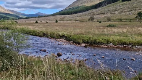 Typical Scottish landscape with mountains and river Stock Footage 293711385