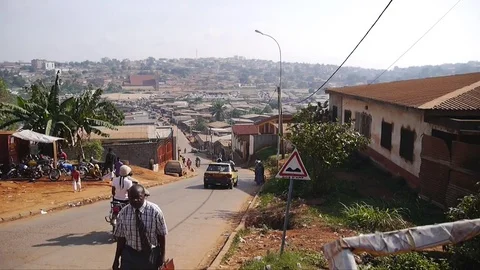 Typical sloping street in Yaounde Stock Footage 81066602