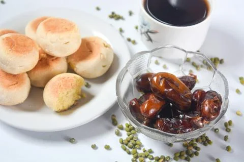 Typical snack from Java, Indonesia. Bakpia filled with nuts, black coffee a.. 写真素材