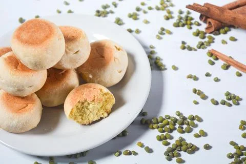 Typical snack from Java, Indonesia. Bakpia filled with nuts, black coffee a.. 库存照片