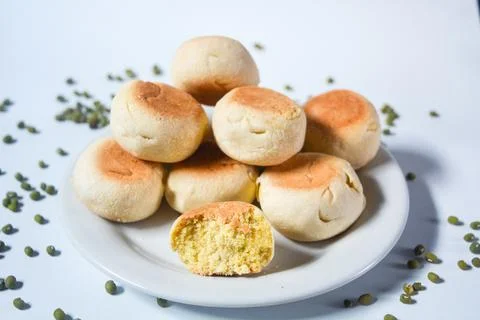 Typical snack from Java, Indonesia. Bakpia filled with nuts, black coffee a.. 스톡 사진