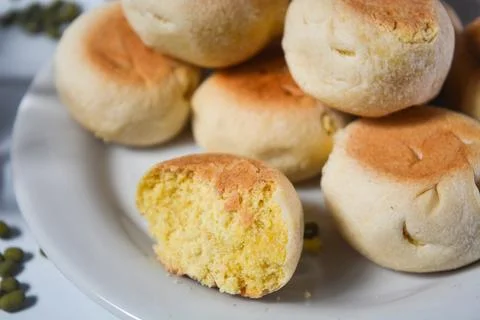 Typical snack from Java, Indonesia. Bakpia filled with nuts, black coffee a.. 库存照片