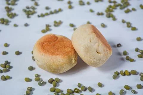 Typical snack from Java, Indonesia. Bakpia filled with nuts, black coffee a.. 스톡 사진