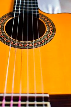 Typical Spanish guitar with the strings. Stock Photos
