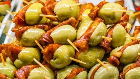 Typical Spanish olive tapas in a bar Stock Photos