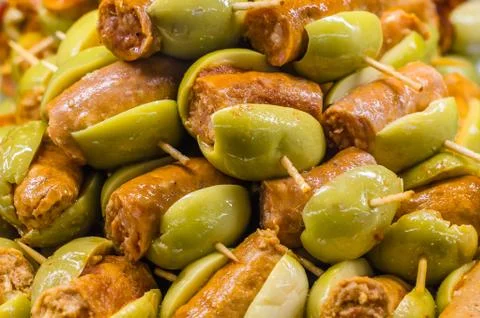 Typical Spanish olive tapas in a bar Stock Photos