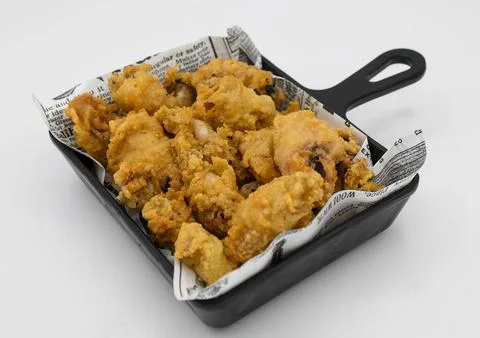 Typical Spanish portion of fried squid Stock Photos