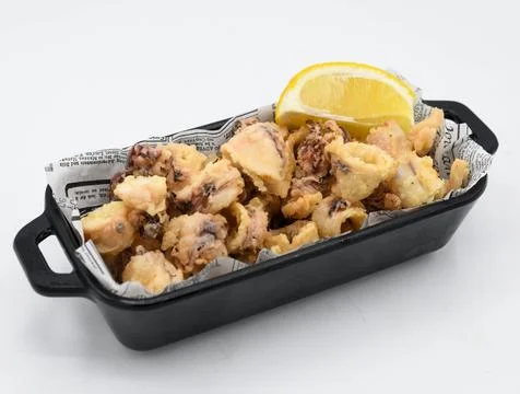 Typical Spanish portion of fried squid Stock Photos