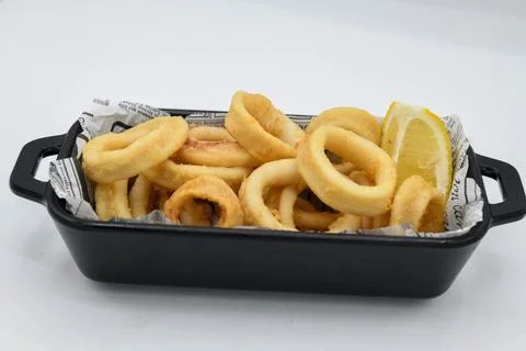 Typical Spanish portion of fried squid Foto stock