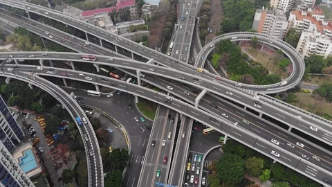 Typical stacked flyovers of big interchange in Chinese city, aerial perspective Stock Footage 92617614