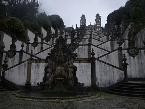 Typical stone grotto with moss and saints, Portugal Stock Photos