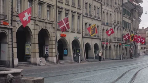 Typical street during the day in Bern Old town with fountain, Bern and Swiss Stock Footage 337601683