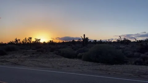 Typical sunset in the Mojave Desert, which is the largest and hottest desert Stock Footage 254004765