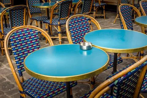 Typical table and chairs in the streets of Paris, France Stock Photos
