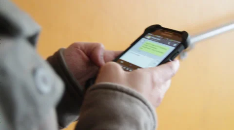 Typical tennage boy texting on his phone Stock Footage 36173696