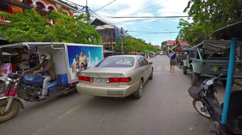 Typical traffic along a city street in Siem Reap. Video 1920x1080 Stock Footage 59881534
