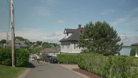 Typical upscale New England style street in residential area. Hingham, MA, USA. Stock Footage 282442982