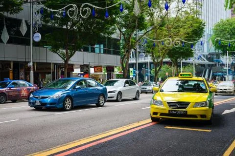 Typical urban traffic, along Orchard Road, Singapore Stock Photos