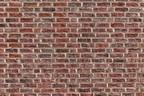 Typical wall with red bricks. Stock Photos