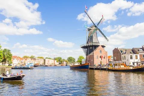 Typical windmill and medieval architecture in Haarlem Stock Photos
