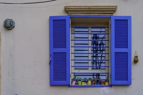 Typical window with blue shutters, in Jaffa Stock Photos