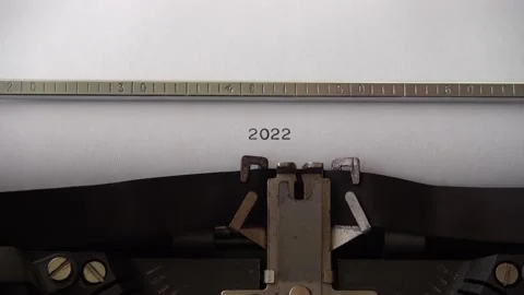 Typing 2022 on retro typewriter. Close up.	 Stock Footage 160596595