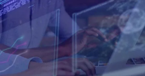 Typing analyst wearing long sleeve shirt at desk showing laptop keyboard with Foto stock