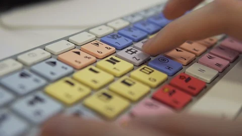 Typing and Coding on Editing Keyboard with Colorful Buttons and Letters Stock Footage 124658335