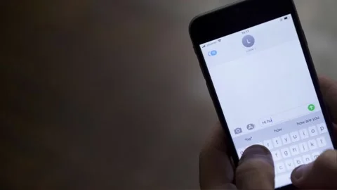 Typing and Sending Text Message on Phone- Negative Space Stockbeeldmateriaal 153421449