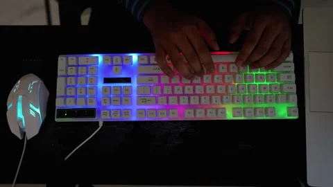 Typing on Backlit Keyboard with Gaming Mouse Stock Footage 318578122