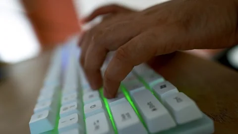 Typing on Backlit Mechanical Keyboard, Close-Up of Hands Typing on Computer.. Stock Footage 315983124