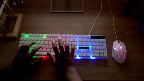 Typing on Backlit Mechanical Keyboard with Gaming Mouse Stock Footage 315982316