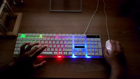 Typing on Backlit Mechanical Keyboard with Gaming Mouse Stock Footage 315982332