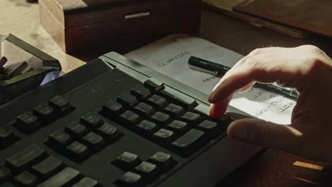 Typing Calculations and Writing Notes During Accounting or Analysis Task Stock Footage 337765351