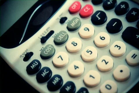 Typing on a calculator Stock Footage 744529