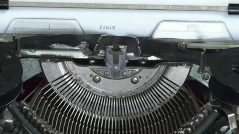 Typing city name PARIS. Typewriting on old typewriter Stock Footage 170080357