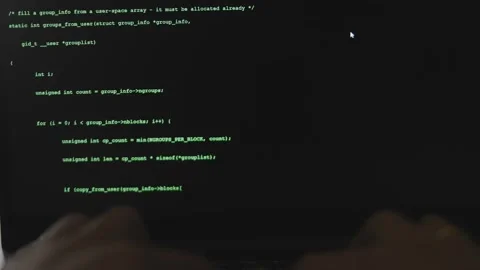 Typing code on keyboard late night working and bypassing cyber security. Hacker Stock Footage 272592218
