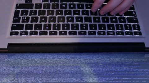 Typing computer code on laptop Stock Footage 11277615