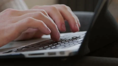 Typing on a computer Stock Footage 229092572